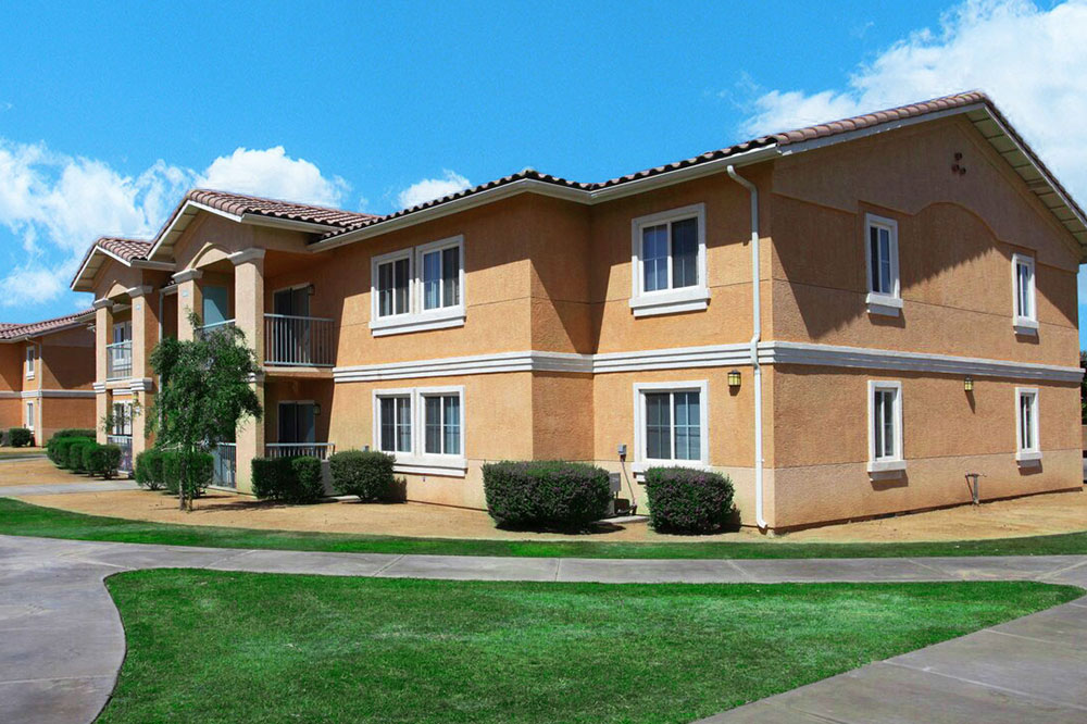 This image displays exterior photo of Villa Monterey Apartments