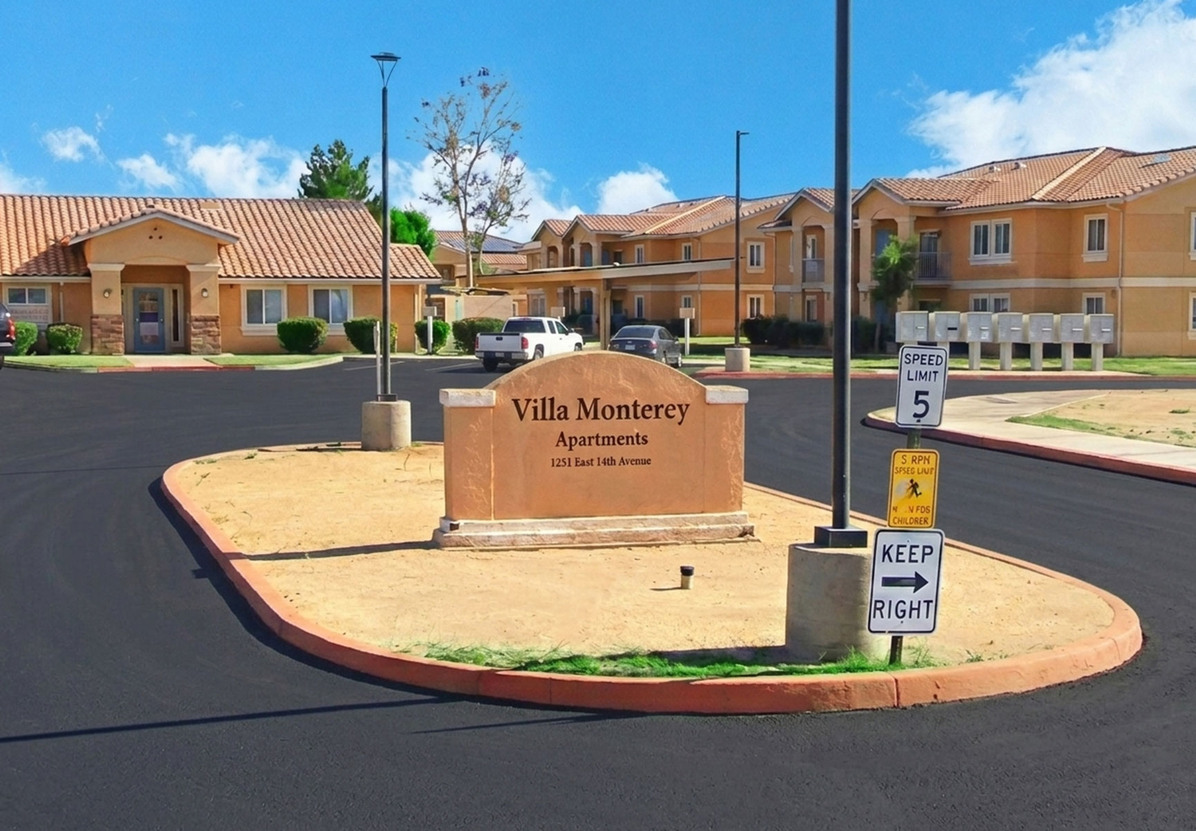 This image displays entrance marker photo of Villa Monterey Apartments